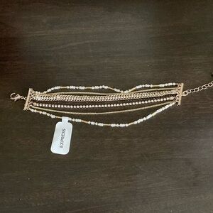 Express Elegant Gold and Silver Multi-Strand Bracelet